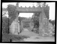 Ornately carved gateway. Location unknown.