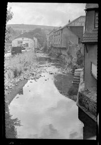 The River Okement running between houses at Okehampton