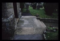 Bovey Tracey church porch with crosses inscribed on slabs