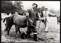 Pony Fair, John White leading pony