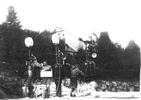 Three boys with petrol pumps at Manaton