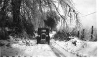 The Clements Delivering Newspapers in Their Austin 7 During the Great Blizzard of 1947