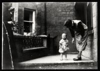 Rosemary Wonnacott & Nellie Lee outside Endacott's baker's shop