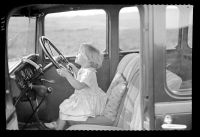 Young Shirley Taylor at the wheel