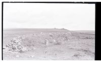 Stone row at Black Tor by a newtake wall