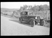 Sydney Taylor's first car, an Austin saloon, at Burrator