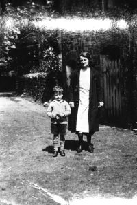 Mabel Skerrett with her son at Cripdon Farm, near Manaton