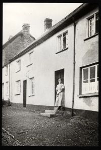 Harriet White on steps of Lamb Farm