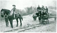 1WW WOMEN FORESTRY WORKERS IN DEVON WITH BAULKS OF TIMBER 