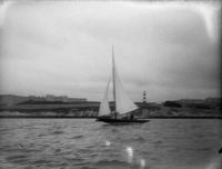 YACHT, PLYMOUTH HOE AND SMEATON LIGHTHOUSE IN BACKGROUND