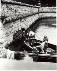 Royal Naval divers working on a  jammed valve at the Burrator Reservoir