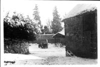 Snow at Manaton, with old car and barn