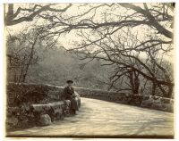 Holne Bridge with unknown lady sitting on parapetUncatalogued