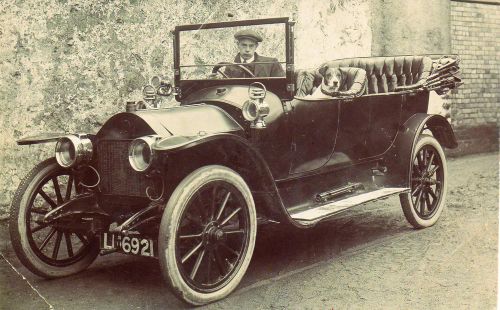 Uncatalogued: Percy Peters in his car at the rear of Bovey Stores.jpg