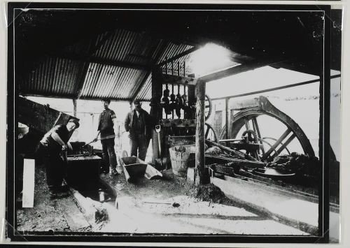 Men at work with machinery