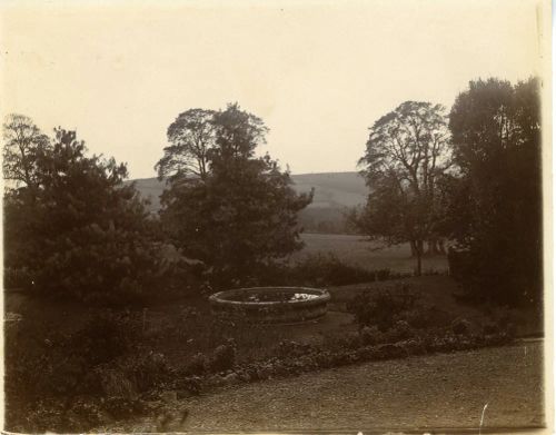 Hele House; Looking across the garden fountain towards Dartmoor