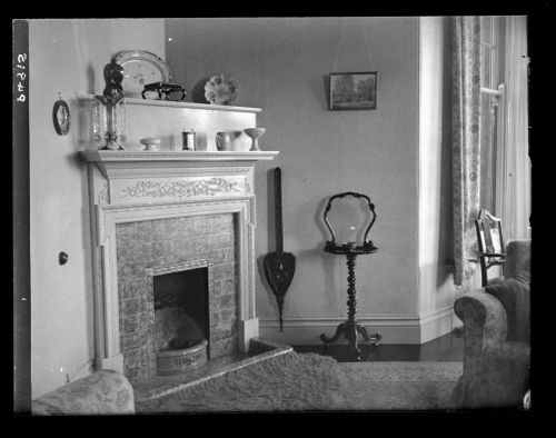 Fireplace in the drawing room at Gratton 