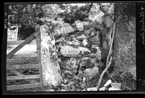 Wall incorporating the shaft of a cross at Cholwich Town Farmhouse