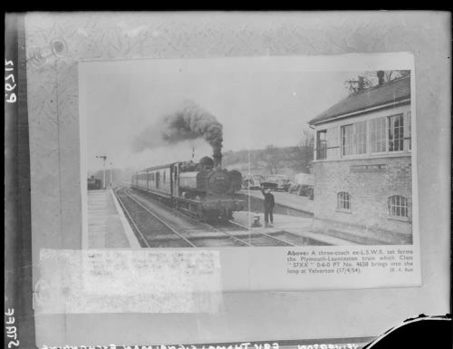 Pannier tank engine and train on Yelverton railway station , with Eric Thomas, the signalman.