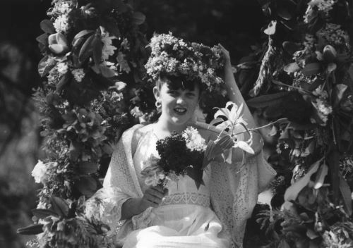 The May Queen being crowned on the May Day Rock