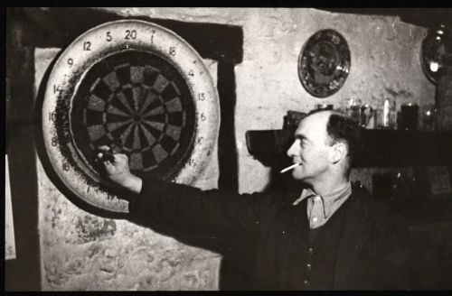 Will Wedlake playing darts in Oxenham Arms