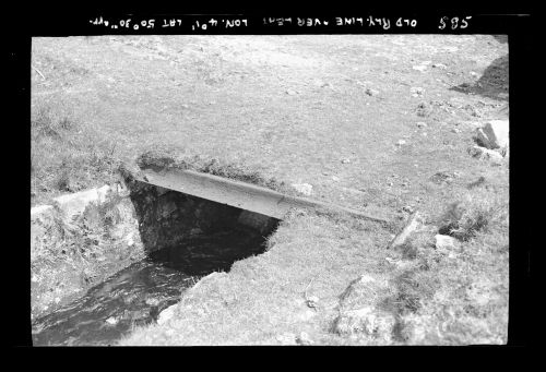 Old rail forming part of bridge