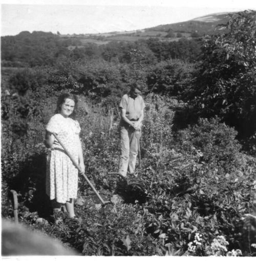 Mrs French and Brenda Beer in the garden at Great Hound Tor Farm