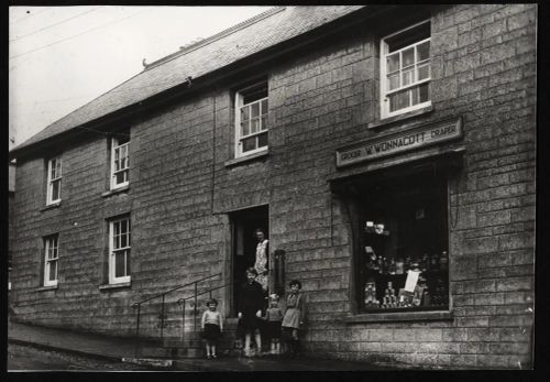 Family outside Wonnacott's ( Coombe's) Store