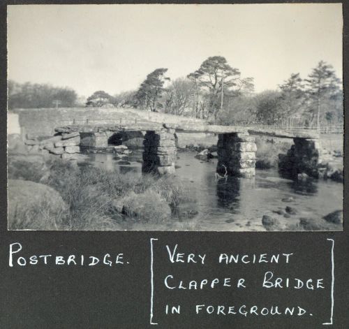 Postbridge - very ancient clapper bridge in foreground.